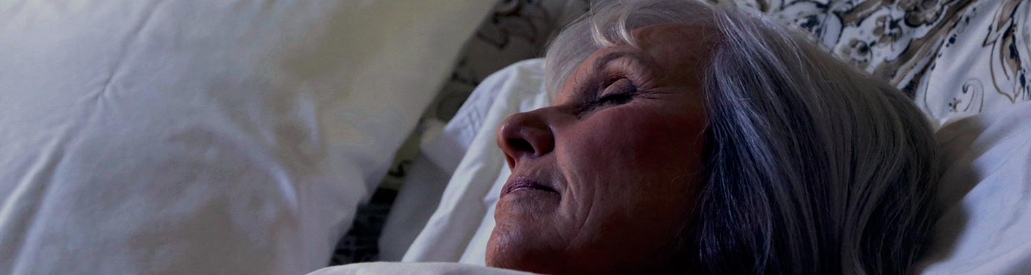 Image of Rose sleeping in bed